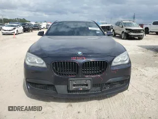2015 BMW 7 Series 750i with VIN WBAYA8C59FG197642, listed as a Copart auction lot 70282884 with 130,853 mi miles and Salvage title. Bid and sale history available at DreamBid. Image 5.