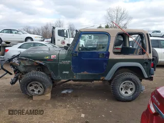 1997 Jeep Wrangler SE with VIN 1J4FY29PXVP406939, listed as a IAAI auction lot 41612380 with 248,314 mi miles. Bid and sale history available at carsss.com. Image 14.