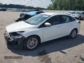 2017 Ford Focus SE with VIN 1FADP3F26HL309415, listed as a Copart auction lot 59470605 with 82,851 mi miles and Salvage title. Bid and sale history available at DreamBid. Image 1.