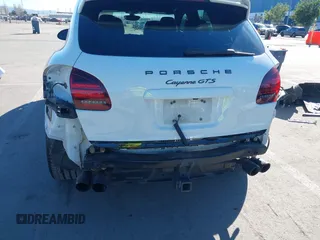 2013 Porsche Cayenne GTS with VIN WP1AD2A22DLA71143, listed as a IAAI auction lot 41287138 with 143,434 mi miles and . Bid and sale history available at DreamBid. Image 20.