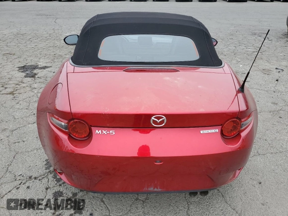 2021 Mazda MX-5 Miata Sport с VIN JM1NDAB78M0454772, выставлен на аукционе Copart как лот 63319665 с пробегом 58 373 миль миль и Списание • Salvage title. История ставок и продаж доступна на DreamBid. Изображение 6.
