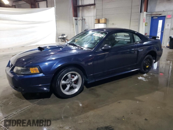 2001 Ford Mustang GT Deluxe with VIN 1FAFP42X61F186011, listed as a Copart auction lot 43812845 with 96,864 mi miles and Salvage Title. Bid and sale history available at carsss.com. Image 1.