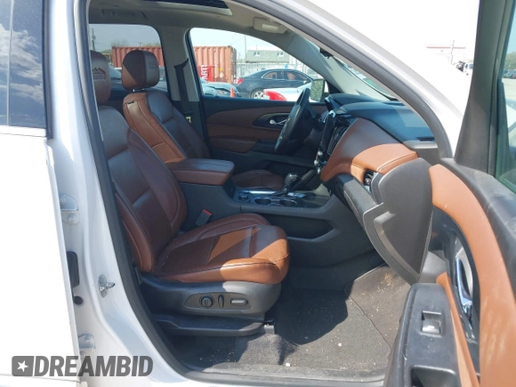 2018 Chevrolet Traverse High Country with VIN 1GNEVKKW9JJ111962, listed as a IAAI auction lot 42118324 with 104,311 mi miles and . Bid and sale history available at DreamBid. Image 5.