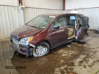 2009 Honda Odyssey LX z VIN 5FNRL38279B041259, wystawiony jako Copart lot #77437094 z przebiegiem 243 754 mil mil oraz Szkoda całkowita • Salvage title. Historia ofert i sprzedaży dostępna na DreamBid. Obrazek 1.