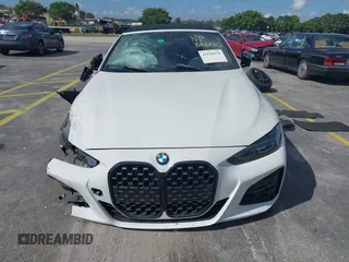 2023 BMW 4 Series 430i with VIN WBA23AT06PCL13531, listed as a IAAI auction lot 41528176 with 26,961 mi miles. Bid and sale history available at carsss.com. Image 11.
