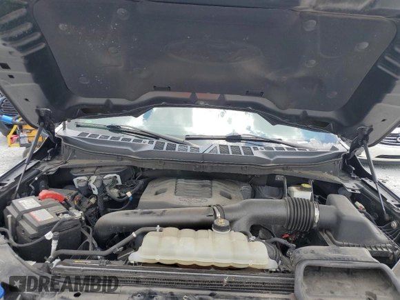 2021 Ford F-150 XL with VIN 1FTFW1E87MFC00633, listed as a Copart auction lot 65318235 with 91,264 mi miles and Salvage title. Bid and sale history available at DreamBid. Image 11.