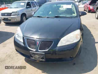 2005 Pontiac G6 with VIN 1G2ZG528554140262, listed as a IAAI auction lot 42592728 with 155,397 mi miles and . Bid and sale history available at DreamBid. Image 6.