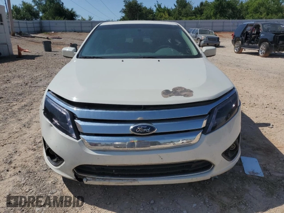 2012 Ford Fusion SEL z VIN 3FAHP0JA3CR336743, wystawiony jako Copart lot #45455065 z przebiegiem 126 456 mil mil oraz Szkody całkowita. Historia ofert i sprzedaży dostępna na DreamBid. Obrazek 5.
