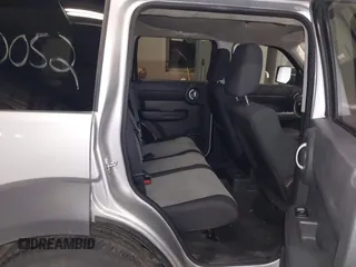 2007 Dodge Nitro SXT with VIN 1D8GU28K47W569317, listed as a IAAI auction lot 41740052 with 220,265 mi miles. Bid and sale history available at carsss.com. Image 8.
