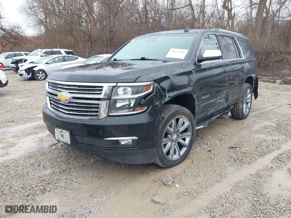 2016 Chevrolet Tahoe LTZ with VIN 1GNSKCKC2GR104305, listed as a IAAI auction lot 41697868 with 124,670 mi miles. Bid and sale history available at carsss.com. Image 19.