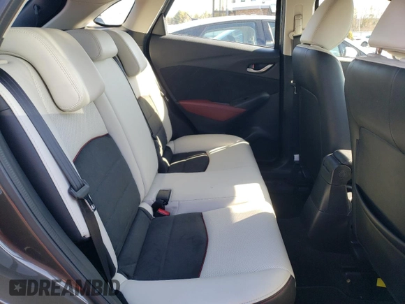 2016 Mazda CX-3 Grand Touring z VIN JM1DKBD7XG0107274, wystawiony jako Copart lot #52137385 z przebiegiem 35 376 mil mil oraz Szkoda całkowita • Salvage title. Historia ofert i sprzedaży dostępna na DreamBid. Obrazek 10.