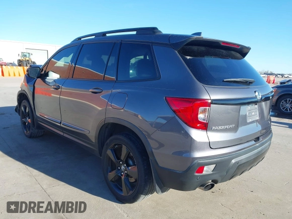 2019 Honda Passport Elite z VIN 5FNYF8H07KB015720, wystawiony jako IAAI lot #41221298 z przebiegiem 65 747 mil mil oraz . Historia ofert i sprzedaży dostępna na DreamBid. Obrazek 3.