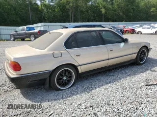 1998 BMW 7 Series 740il with VIN WBAGJ8323WDM24309, listed as a Copart auction lot 65705964 with 206,422 mi miles and Clean Title. Bid and sale history available at carsss.com. Image 3.