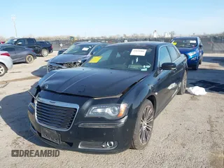 2013 Chrysler 300 with VIN 2C3CCABG7DH573164, listed as a IAAI auction lot 41851066 with 218,234 mi miles. Bid and sale history available at carsss.com. Image 2.