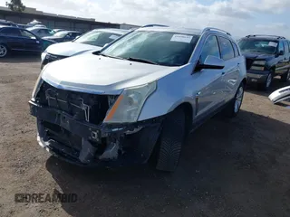 2014 Cadillac SRX Performance Collection with VIN 3GYFNCE39ES544135, listed as a IAAI auction lot 41808644 with 145,772 mi miles and . Bid and sale history available at carsss.com. Image 18.