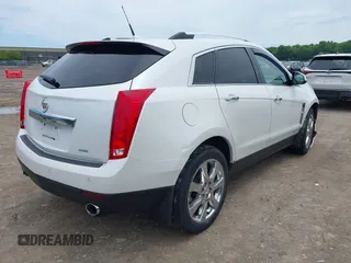 2012 Cadillac SRX Performance Collection with VIN 3GYFNEE34CS579352, listed as a IAAI auction lot 42627607 with 168,752 mi miles and . Bid and sale history available at DreamBid. Image 4.