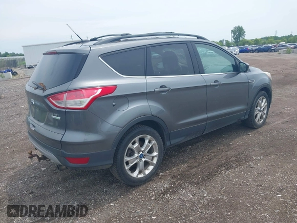 2013 Ford Escape SE with VIN 1FMCU0GX2DUA31362, listed as a IAAI auction lot 42564337 with 157,737 mi miles and . Bid and sale history available at DreamBid. Image 4.