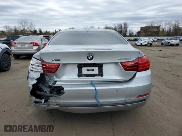 2016 BMW 4 Series 428i xDrive with VIN WBA3N9C56GK249666, listed as a Copart auction lot 53881285 with 140,031 mi miles and Salvage title. Bid and sale history available at DreamBid. Image 6.