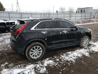 2023 Cadillac XT4 FWD Luxury с VIN 1GYAZAR40PF168776, выставлен на аукционе Copart как лот 50130855 с пробегом 67 048 миль миль и Чистый • Clean title. История ставок и продаж доступна на DreamBid. Изображение 3.