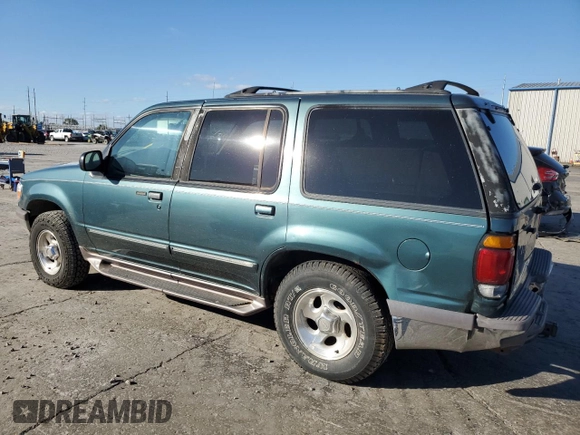 1997 Ford Explorer XL with VIN 1FMDU34E2VZC03015, listed as a Copart auction lot 80654764 with 295,587 mi miles and Salvage title. Bid and sale history available at DreamBid. Image 2.