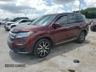 2019 Honda Pilot Touring 7-Passenger with VIN 5FNYF6H6XKB094020, listed as a Copart auction lot 61460255 with 135,149 mi miles and Salvage title. Bid and sale history available at DreamBid. Image 1.