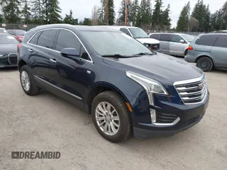 2017 Cadillac XT5 FWD with VIN 1GYKNARS2HZ188557, listed as a IAAI auction lot 41840764 with 104,524 mi miles. Bid and sale history available at carsss.com. Image 1.