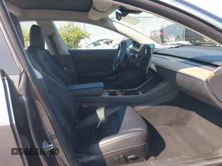 2018 Tesla Model 3 Long Range Battery with VIN 5YJ3E1EA4JF024102, listed as a IAAI auction lot 42100621 with 86,298 mi miles and . Bid and sale history available at DreamBid. Image 5.