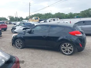 2016 Hyundai Veloster with VIN KMHTC6AD6GU251094, listed as a IAAI auction lot 41971550 with 97,744 mi miles. Bid and sale history available at carsss.com. Image 14.