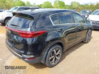 2020 Kia Sportage LX with VIN KNDPM3AC7L7755719, listed as a IAAI auction lot 42026994 with 49,537 mi miles and . Bid and sale history available at DreamBid. Image 4.