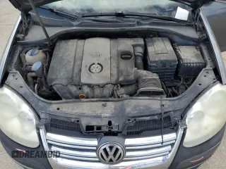 2009 Volkswagen Jetta S with VIN 3VWJM71K59M007776, listed as a Copart auction lot 53959525 with 190,557 mi miles and Salvage title. Bid and sale history available at DreamBid. Image 11.