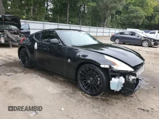 2013 Nissan 370Z with VIN JN1AZ4EH7DM880602, listed as a Copart auction lot 70782934 with 131,503 mi miles and Salvage Title. Bid and sale history available at carsss.com. Image 4.