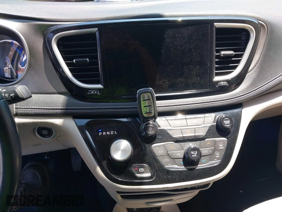 2021 Chrysler Pacifica Hybrid Touring L with VIN 2C4RC1L71MR599631, listed as a IAAI auction lot 42151965 with 67,401 mi miles and . Bid and sale history available at DreamBid. Image 11.
