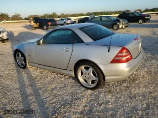 2001 Mercedes-Benz SLK-Class with VIN WDBKK65F31F230678, listed as a Copart auction lot 84119664 with 94,941 mi miles and Salvage Title. Bid and sale history available at carsss.com. Image 2.