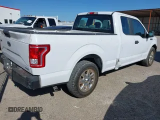 2015 Ford F-150 XL with VIN 1FTEX1C83FKE18476, listed as a IAAI auction lot 41835472 with 243,437 mi miles. Bid and sale history available at carsss.com. Image 4.