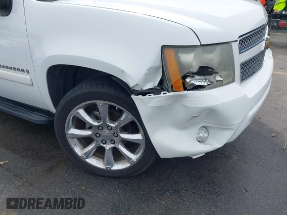 2008 Chevrolet Suburban LTZ with VIN 1GNFC16018R143195, listed as a IAAI auction lot 41577367 with 223,506 mi miles and . Bid and sale history available at DreamBid. Image 6.