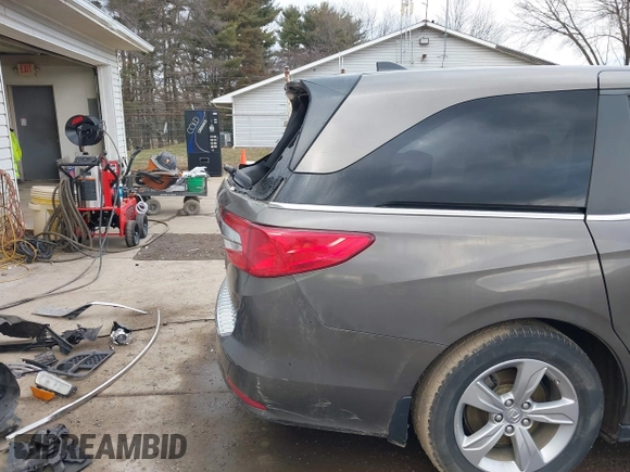 2019 Honda Odyssey EX with VIN 5FNRL6H50KB097304, listed as a IAAI auction lot 41659899 with 128,641 mi miles. Bid and sale history available at carsss.com. Image 21.