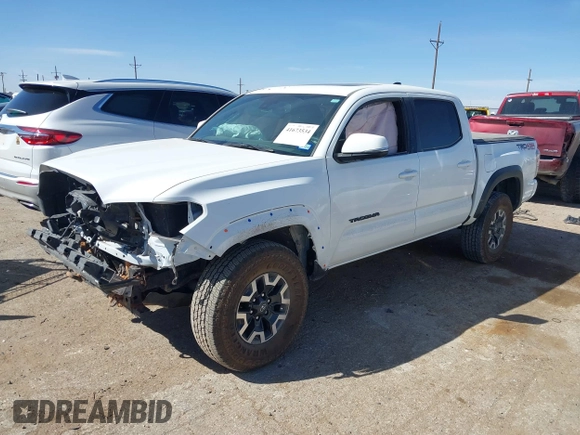 2023 Toyota Tacoma 4WD SR with VIN 3TMCZ5AN7PM653250, listed as a IAAI auction lot 41673534 with 19,496 mi miles. Bid and sale history available at carsss.com. Image 18.