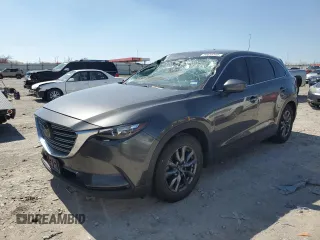 2021 Mazda CX-9 Touring z VIN JM3TCACY5M0500924, wystawiony jako Copart lot #50654505 z przebiegiem 57 067 mil mil oraz Szkoda całkowita • Salvage title. Historia ofert i sprzedaży dostępna na DreamBid. Obrazek 1.