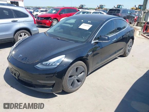 2018 Tesla Model 3 Long Range Battery with VIN 5YJ3E1EA7JF098632, listed as a IAAI auction lot 42002181 with 73,371 mi miles and . Bid and sale history available at DreamBid. Image 21.