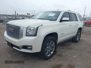 2015 GMC Yukon Denali z VIN 1GKS1CKJ3FR713531, wystawiony jako IAAI lot #41866691 z przebiegiem 157 666 mil mil oraz . Historia ofert i sprzedaży dostępna na DreamBid. Obrazek 18.
