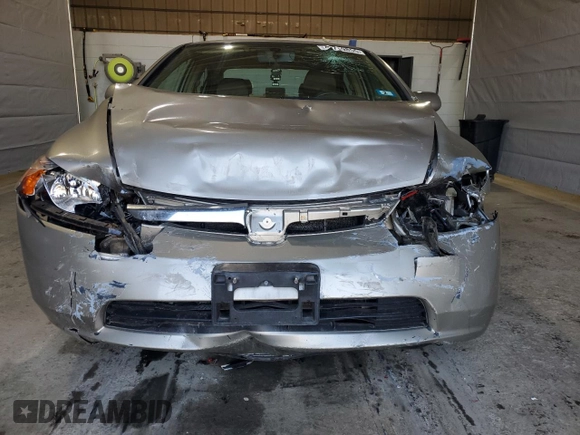 2006 Honda Civic LX with VIN 2HGFA16596H517075, listed as a Copart auction lot 48739855 with 81,174 mi miles and Salvage Title. Bid and sale history available at DreamBid. Image 5.
