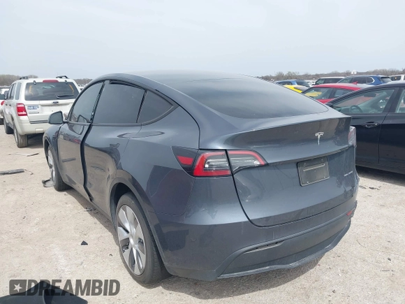 2023 Tesla Model Y Long Range with VIN 7SAYGDEE0PA036048, listed as a IAAI auction lot 41775845 with 41,291 mi miles. Bid and sale history available at carsss.com. Image 3.