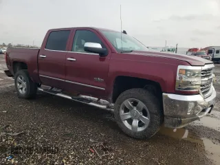 2017 Chevrolet Silverado 1500 LTZ with VIN 3GCPCSEC7HG294959, listed as a Copart auction lot 45049545 with 198,686 mi miles and Salvage Title. Bid and sale history available at DreamBid. Image 4.