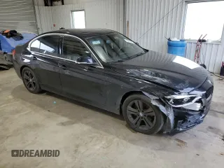 2018 BMW 3 Series 330i with VIN WBA8B9G56JNU98063, listed as a Copart auction lot 48202215 with 38,782 mi miles and Salvage title. Bid and sale history available at DreamBid. Image 4.