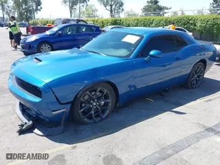 2023 Dodge Challenger GT with VIN 2C3CDZJG9PH662218, listed as a IAAI auction lot 42001149 with 3,852 mi miles. Bid and sale history available at carsss.com. Image 2.