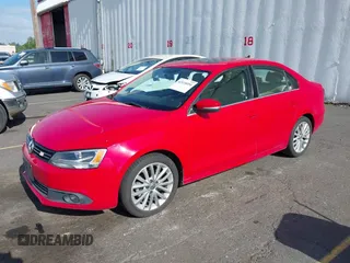 2014 Volkswagen Jetta TDI w/Premium with VIN 3VWLL7AJ8EM372627, listed as a IAAI auction lot 42418054 with 119,926 mi miles and . Bid and sale history available at DreamBid. Image 2.