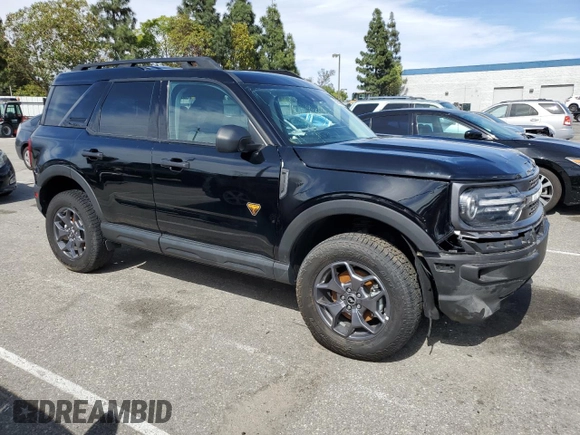 2023 Ford Bronco Sport Badlands z VIN 3FMCR9D97PRD35830, wystawiony jako Copart lot #56950865 z przebiegiem 7 401 mil mil oraz Szkoda całkowita • Salvage title. Historia ofert i sprzedaży dostępna na DreamBid. Obrazek 4.