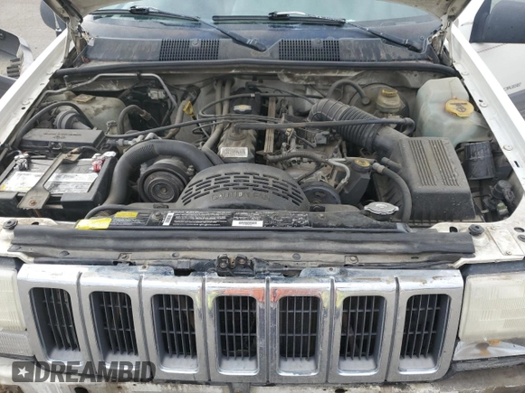 1997 Jeep Grand Cherokee Laredo with VIN 1J4GZ58S2VC676652, listed as a Copart auction lot 64939974 with 256,923 mi miles and Salvage Title. Bid and sale history available at carsss.com. Image 12.