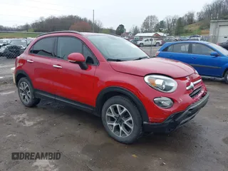 2018 FIAT 500X Trekking z VIN ZFBCFYCB6JP690033, wystawiony jako IAAI lot #41966797 z przebiegiem 129 236 mil mil oraz . Historia ofert i sprzedaży dostępna na DreamBid. Obrazek 1.