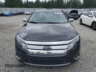 2012 Ford Fusion SEL z VIN 3FAHP0JG2CR433596, wystawiony jako Copart lot #59769105 z przebiegiem 126 230 mil mil oraz Czysty tytuł • Clean title. Historia ofert i sprzedaży dostępna na DreamBid. Obrazek 5.